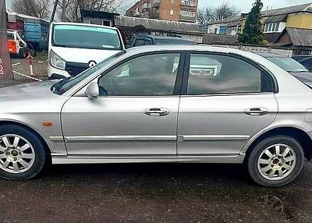 Серый Киа Маджентис, объемом двигателя 2 л и пробегом 290 тыс. км за 2700 $, фото 5 на Automoto.ua