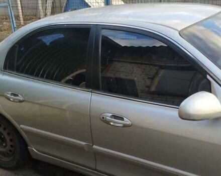 Сірий Кіа Маджентіс, об'ємом двигуна 2 л та пробігом 190 тис. км за 3500 $, фото 5 на Automoto.ua