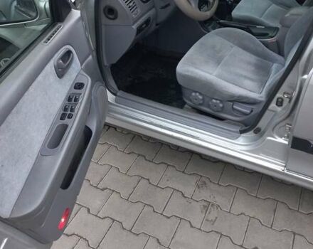 Серый Киа Маджентис, объемом двигателя 2 л и пробегом 270 тыс. км за 2600 $, фото 4 на Automoto.ua