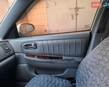 Сірий Кіа Маджентіс, об'ємом двигуна 2 л та пробігом 340 тис. км за 2800 $, фото 6 на Automoto.ua