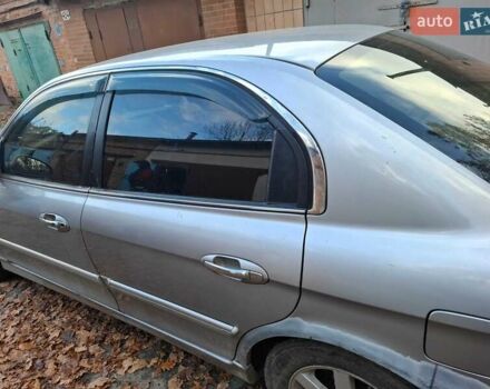 Сірий Кіа Маджентіс, об'ємом двигуна 2 л та пробігом 340 тис. км за 2800 $, фото 1 на Automoto.ua