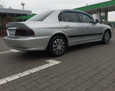 Серый Киа Маджентис, объемом двигателя 2 л и пробегом 270 тыс. км за 2600 $, фото 1 на Automoto.ua