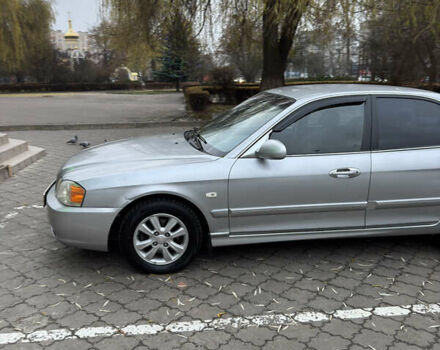 Серый Киа Маджентис, объемом двигателя 2 л и пробегом 267 тыс. км за 3900 $, фото 2 на Automoto.ua