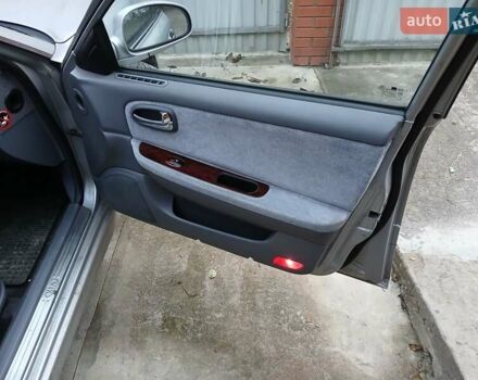 Серый Киа Маджентис, объемом двигателя 2 л и пробегом 271 тыс. км за 3200 $, фото 12 на Automoto.ua