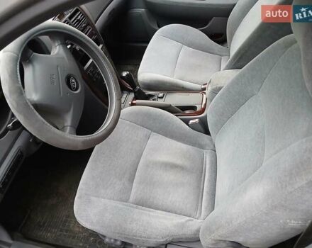 Серый Киа Маджентис, объемом двигателя 2 л и пробегом 271 тыс. км за 3200 $, фото 4 на Automoto.ua