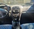 Сірий Кіа Маджентіс, об'ємом двигуна 2 л та пробігом 288 тис. км за 3200 $, фото 8 на Automoto.ua