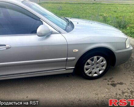 Серый Киа Маджентис, объемом двигателя 2 л и пробегом 234 тыс. км за 3800 $, фото 3 на Automoto.ua