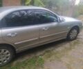 Сірий Кіа Маджентіс, об'ємом двигуна 2 л та пробігом 134 тис. км за 3400 $, фото 2 на Automoto.ua