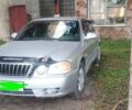 Сірий Кіа Маджентіс, об'ємом двигуна 2 л та пробігом 234 тис. км за 3100 $, фото 1 на Automoto.ua