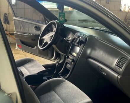 Серый Киа Маджентис, объемом двигателя 2 л и пробегом 234 тыс. км за 3200 $, фото 11 на Automoto.ua