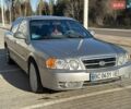 Сірий Кіа Маджентіс, об'ємом двигуна 2 л та пробігом 122 тис. км за 4000 $, фото 1 на Automoto.ua