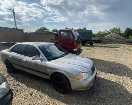 Серый Киа Маджентис, объемом двигателя 2 л и пробегом 334 тыс. км за 3200 $, фото 3 на Automoto.ua