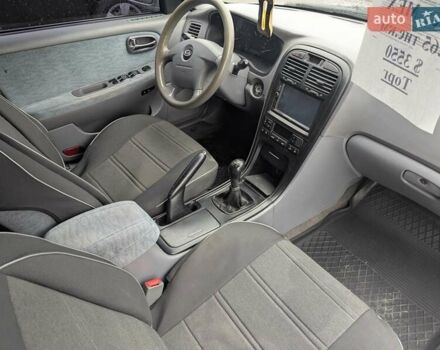 Серый Киа Маджентис, объемом двигателя 2 л и пробегом 264 тыс. км за 2990 $, фото 25 на Automoto.ua