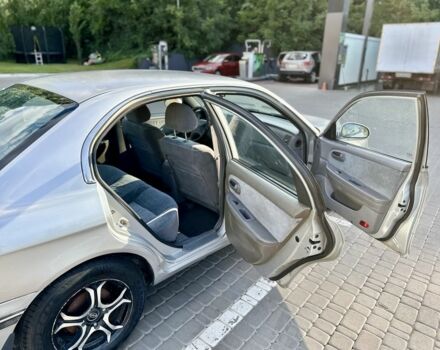 Серый Киа Маджентис, объемом двигателя 2 л и пробегом 280 тыс. км за 3500 $, фото 5 на Automoto.ua