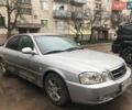Сірий Кіа Маджентіс, об'ємом двигуна 2 л та пробігом 142 тис. км за 5200 $, фото 1 на Automoto.ua