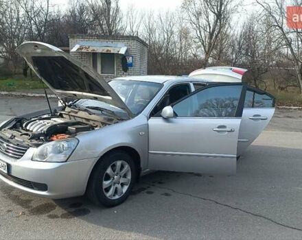 Сірий Кіа Маджентіс, об'ємом двигуна 2 л та пробігом 251 тис. км за 4700 $, фото 2 на Automoto.ua