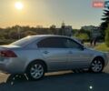 Сірий Кіа Маджентіс, об'ємом двигуна 2 л та пробігом 237 тис. км за 6200 $, фото 1 на Automoto.ua