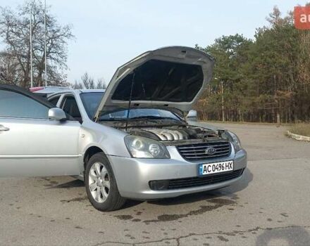 Сірий Кіа Маджентіс, об'ємом двигуна 2 л та пробігом 251 тис. км за 4700 $, фото 1 на Automoto.ua