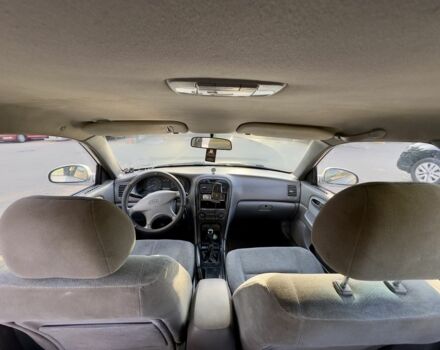 Серый Киа Маджентис, объемом двигателя 2 л и пробегом 280 тыс. км за 3500 $, фото 11 на Automoto.ua