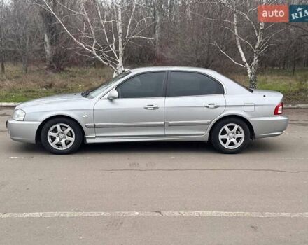 Сірий Кіа Маджентіс, об'ємом двигуна 2 л та пробігом 179 тис. км за 4350 $, фото 3 на Automoto.ua