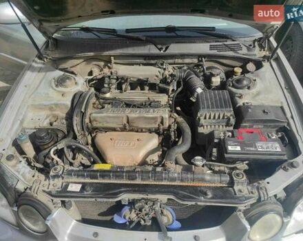 Серый Киа Маджентис, объемом двигателя 2 л и пробегом 240 тыс. км за 3500 $, фото 3 на Automoto.ua