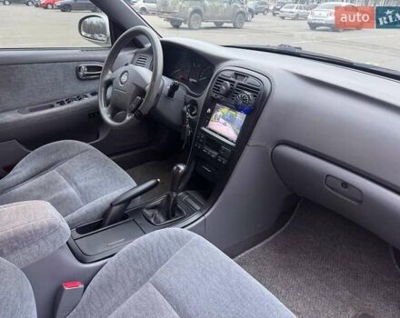 Сірий Кіа Маджентіс, об'ємом двигуна 2 л та пробігом 179 тис. км за 4350 $, фото 8 на Automoto.ua