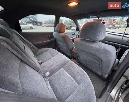 Сірий Кіа Маджентіс, об'ємом двигуна 2 л та пробігом 179 тис. км за 4350 $, фото 11 на Automoto.ua