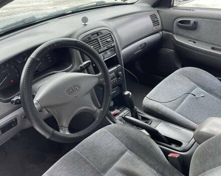 Серый Киа Маджентис, объемом двигателя 2 л и пробегом 250 тыс. км за 2599 $, фото 2 на Automoto.ua