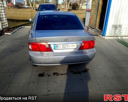Сірий Кіа Маджентіс, об'ємом двигуна 2 л та пробігом 260 тис. км за 4100 $, фото 9 на Automoto.ua