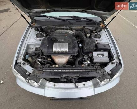 Сірий Кіа Маджентіс, об'ємом двигуна 2 л та пробігом 179 тис. км за 4350 $, фото 12 на Automoto.ua