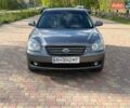 Серый Киа Маджентис, объемом двигателя 2 л и пробегом 206 тыс. км за 5799 $, фото 1 на Automoto.ua