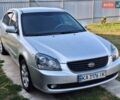 Сірий Кіа Маджентіс, об'ємом двигуна 2 л та пробігом 290 тис. км за 4300 $, фото 1 на Automoto.ua