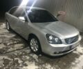 Сірий Кіа Маджентіс, об'ємом двигуна 2 л та пробігом 190 тис. км за 7100 $, фото 1 на Automoto.ua