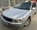 Сірий Кіа Маджентіс, об'ємом двигуна 2 л та пробігом 303 тис. км за 4500 $, фото 1 на Automoto.ua