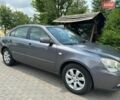Сірий Кіа Маджентіс, об'ємом двигуна 2 л та пробігом 185 тис. км за 6500 $, фото 1 на Automoto.ua