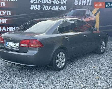 Сірий Кіа Маджентіс, об'ємом двигуна 2 л та пробігом 240 тис. км за 4999 $, фото 3 на Automoto.ua