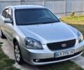 Сірий Кіа Маджентіс, об'ємом двигуна 2 л та пробігом 300 тис. км за 4310 $, фото 1 на Automoto.ua