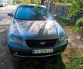 Серый Киа Маджентис, объемом двигателя 2 л и пробегом 310 тыс. км за 4700 $, фото 1 на Automoto.ua