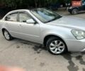 Серый Киа Маджентис, объемом двигателя 2 л и пробегом 241 тыс. км за 5800 $, фото 1 на Automoto.ua