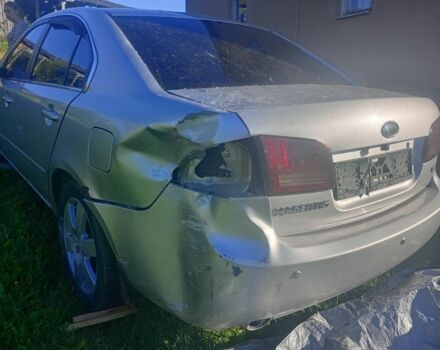 Сірий Кіа Маджентіс, об'ємом двигуна 0 л та пробігом 325 тис. км за 2099 $, фото 1 на Automoto.ua