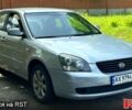 Сірий Кіа Маджентіс, об'ємом двигуна 2 л та пробігом 263 тис. км за 4050 $, фото 1 на Automoto.ua