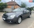 Сірий Кіа Маджентіс, об'ємом двигуна 2 л та пробігом 316 тис. км за 3000 $, фото 1 на Automoto.ua