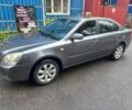 Сірий Кіа Маджентіс, об'ємом двигуна 2 л та пробігом 279 тис. км за 4700 $, фото 2 на Automoto.ua