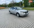 Сірий Кіа Маджентіс, об'ємом двигуна 2 л та пробігом 255 тис. км за 4700 $, фото 1 на Automoto.ua