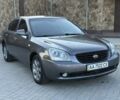 Серый Киа Маджентис, объемом двигателя 2 л и пробегом 207 тыс. км за 5650 $, фото 1 на Automoto.ua