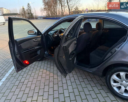 Серый Киа Маджентис, объемом двигателя 2 л и пробегом 281 тыс. км за 5250 $, фото 23 на Automoto.ua