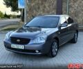Сірий Кіа Маджентіс, об'ємом двигуна 2 л та пробігом 207 тис. км за 5650 $, фото 1 на Automoto.ua