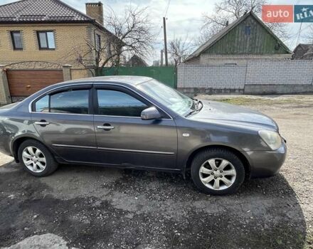 Сірий Кіа Маджентіс, об'ємом двигуна 2 л та пробігом 178 тис. км за 4700 $, фото 3 на Automoto.ua