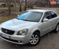 Серый Киа Маджентис, объемом двигателя 2 л и пробегом 270 тыс. км за 4600 $, фото 1 на Automoto.ua