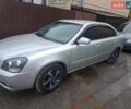 Сірий Кіа Маджентіс, об'ємом двигуна 2 л та пробігом 352 тис. км за 5000 $, фото 1 на Automoto.ua